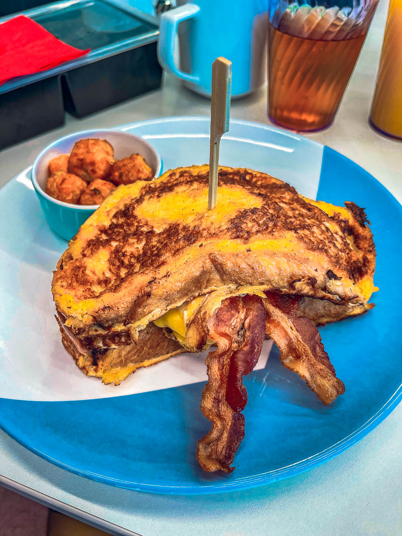 French toast burger from The Galley on Virgin Voyages