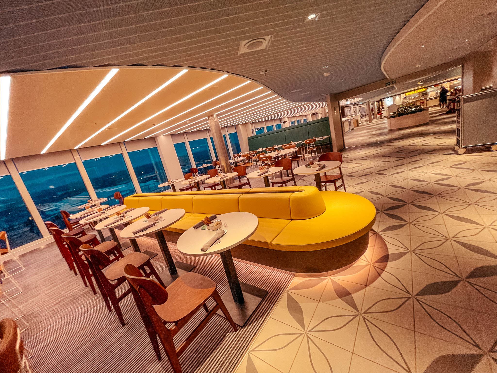 Seating in The Galley food hall on Virgin Voyages