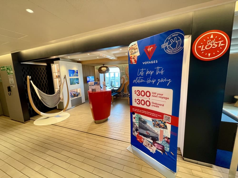 The Future Voyages (formerly Get Lost) desk on a Virgin Voyages ship