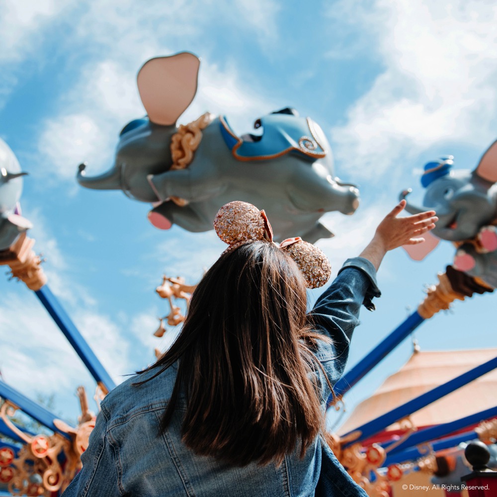 Girl at Dumbo the Flying Elephant, Magic Kingdom Park