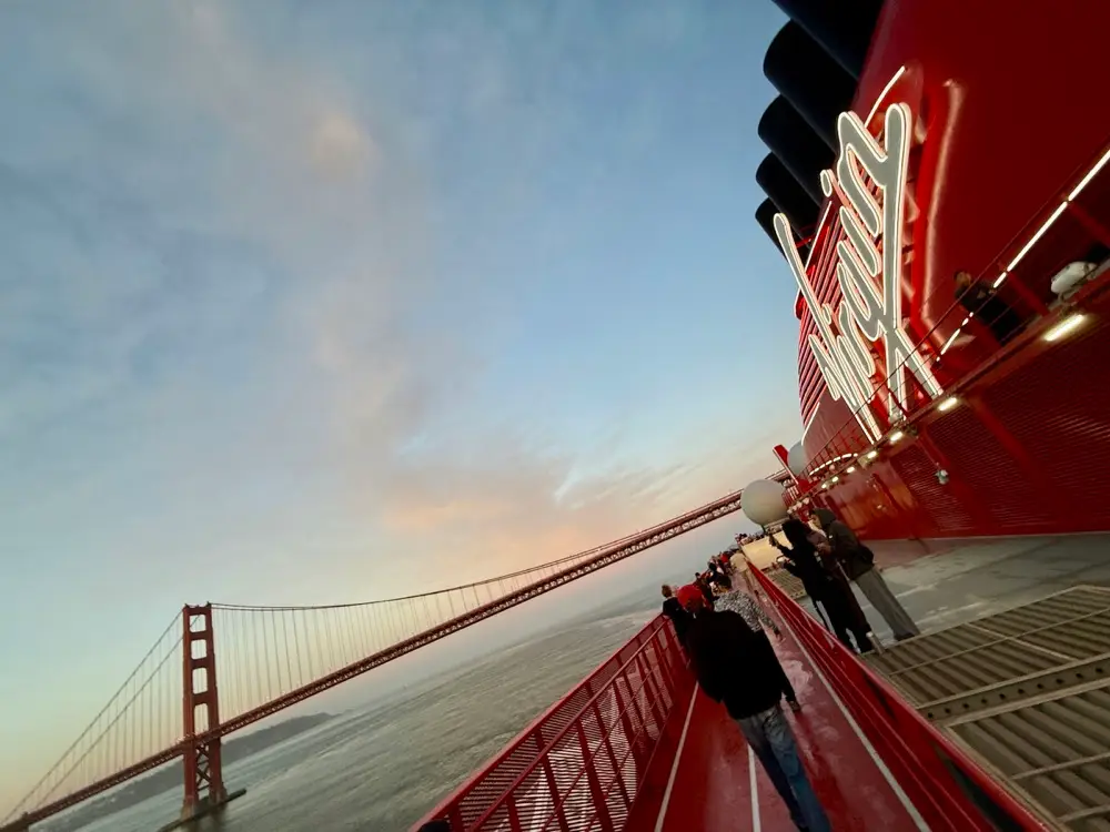 The Golden Gate Bridge seen from the red deck of Virgin Voyages' Brilliant Lady