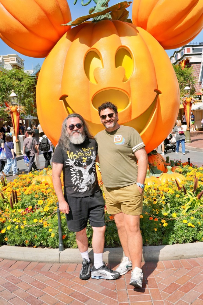 Kieran and Phil with the giant Mickey pumpkin on Main Street, Disneyland