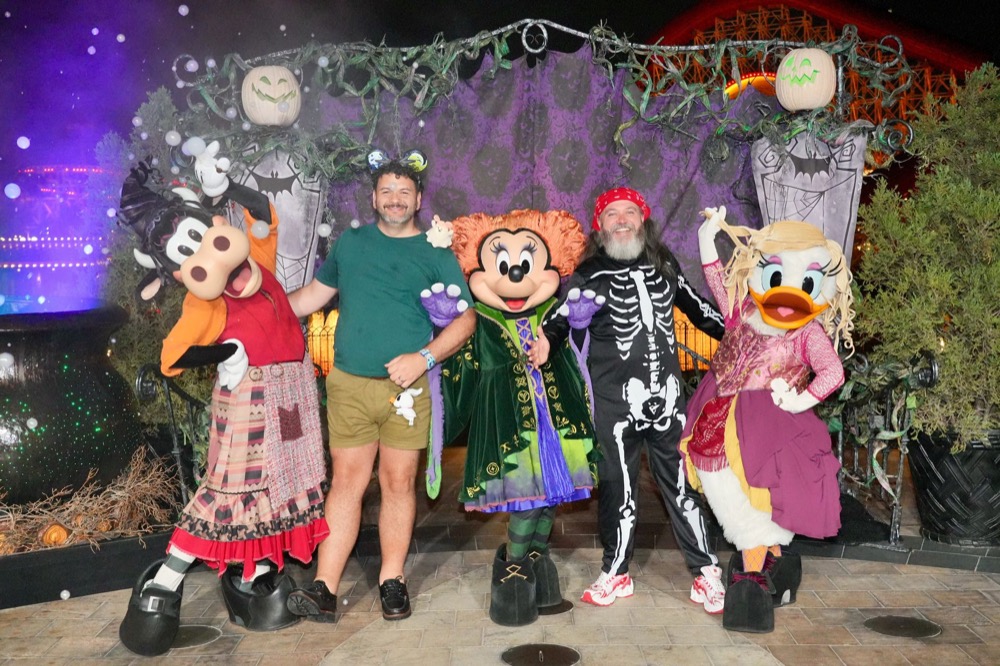 Kieran and Phil meeting Disney characters in Halloween costumes at Oogie Boogie Bash