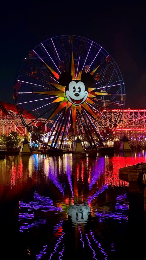 Pixar Pal-A-Round lit up at night during Oogie Boogie Bash