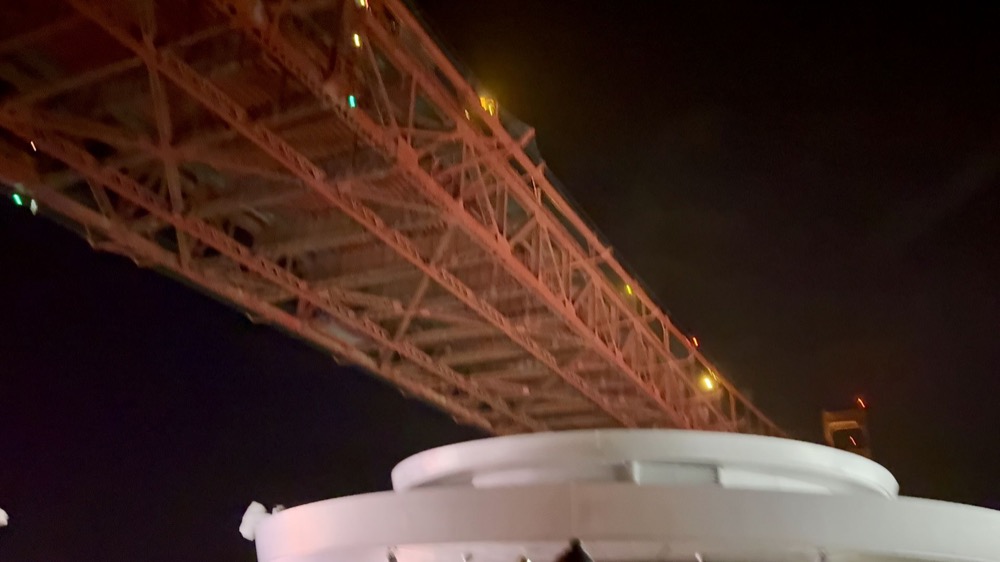 Brilliant Lady sailing under the Golden Gate Bridge at night