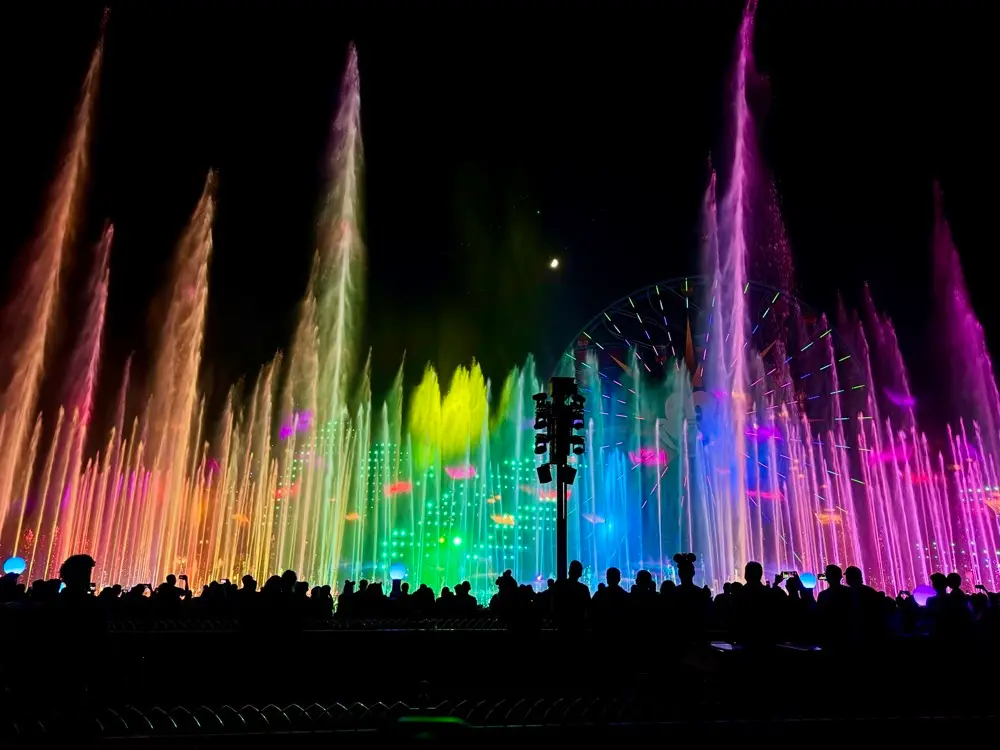 World of Color fountains lit in rainbow colours at Disney California Adventure