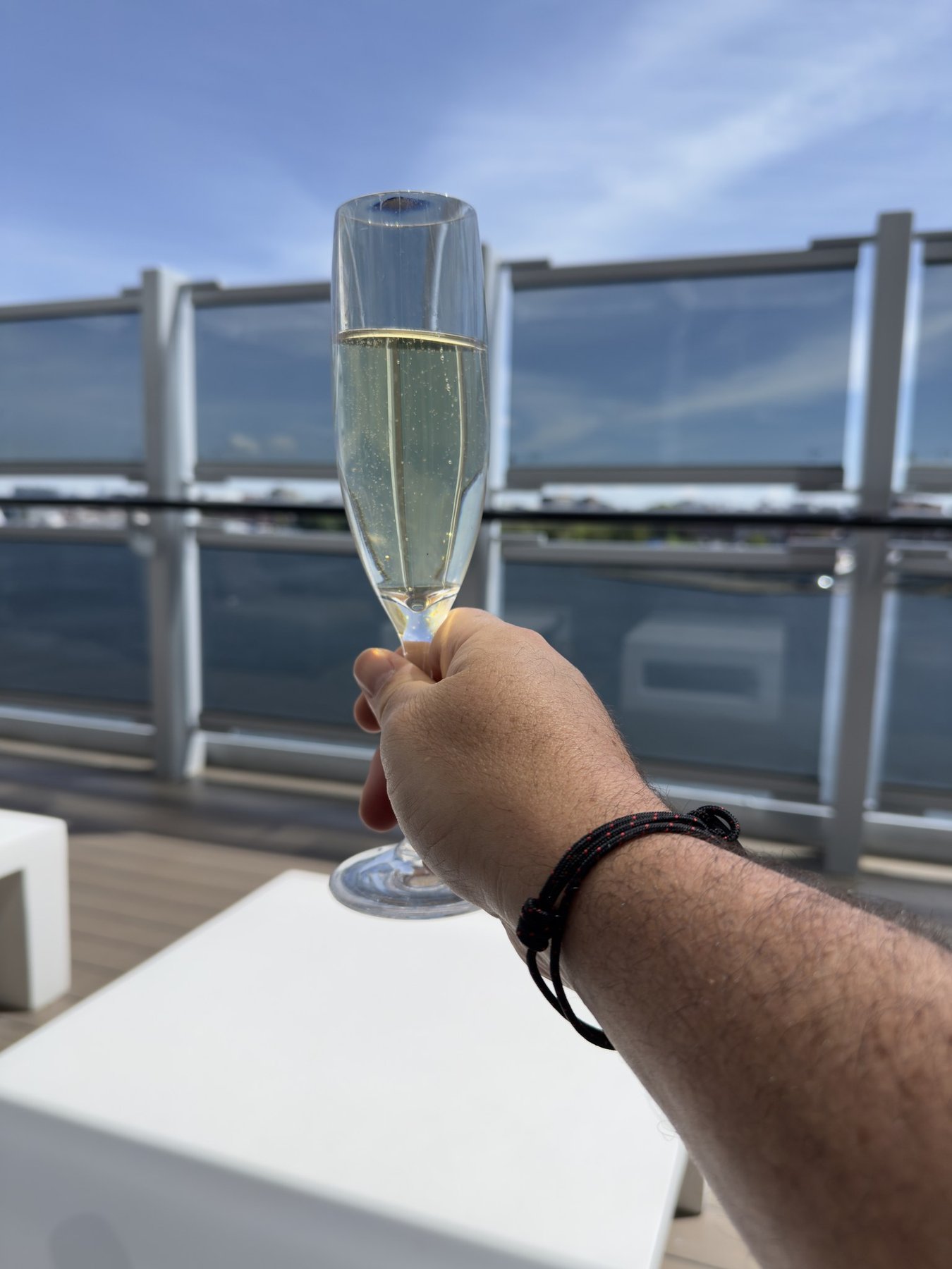 A glass of bubbles at sail-away from Vancouver on Brilliant Lady
