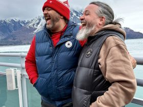 Kieran and Phil at Hubbard Glacier on Virgin Voyages Brilliant Lady