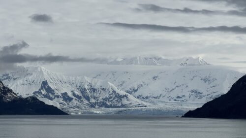 Calm water and snowy mountains in Alaska from Brilliant Lady