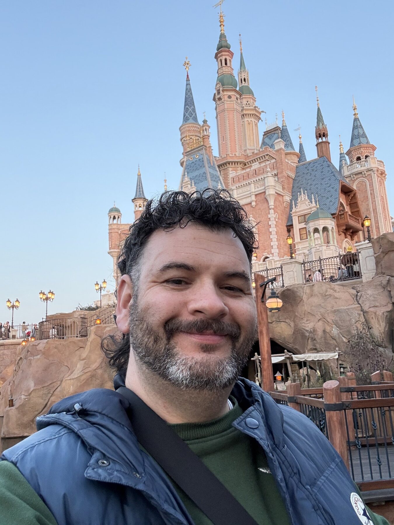 Kieran in front of the castle at Shanghai Disneyland