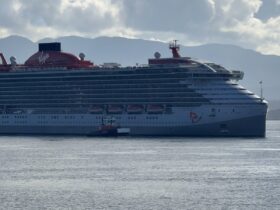 Brilliant Lady in Vancouver harbour with mountains behind