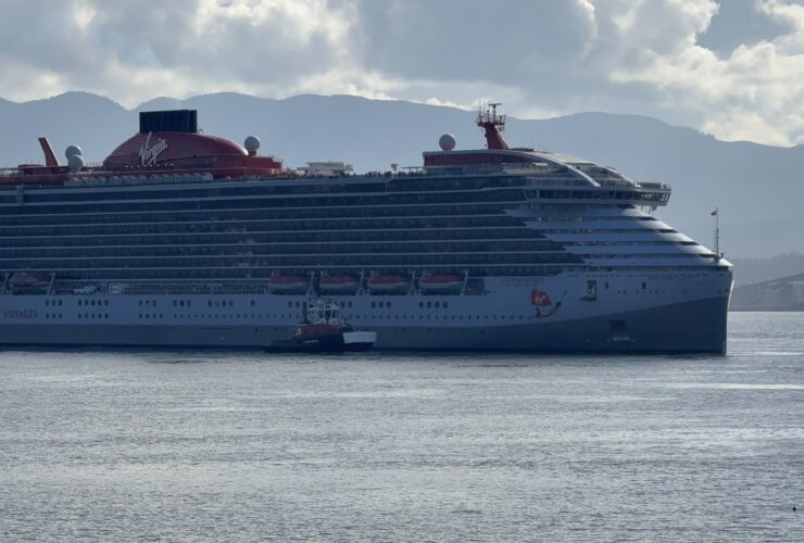 Brilliant Lady in Vancouver harbour with mountains behind