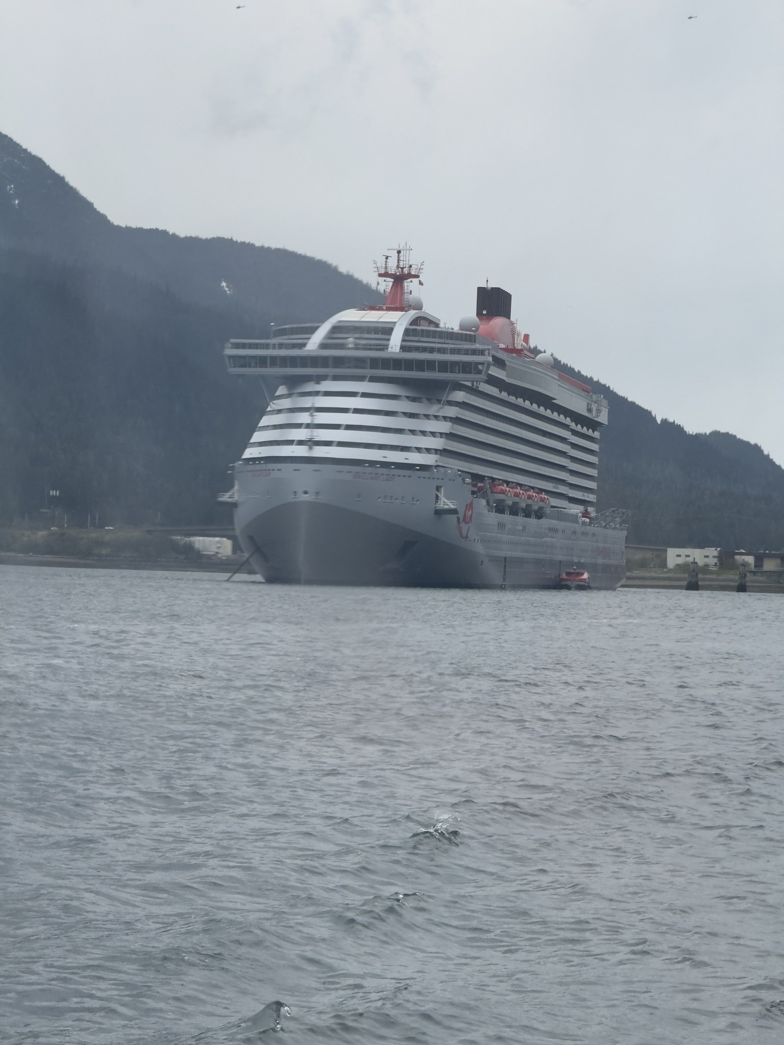 Cruise ship berthed at the Juneau cruise docks on a grey May morning