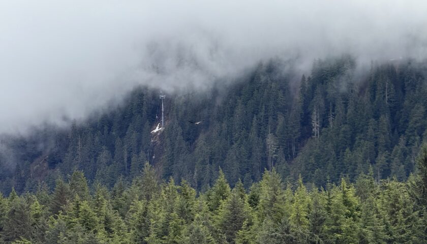 Low cloud over the forested mountains above Icy Strait Point, Alaska