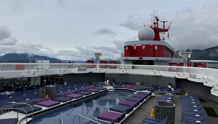 Empty top deck of Virgin Voyages Brilliant Lady at Icy Strait Point in May