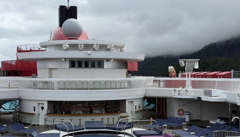 Brilliant Lady upper decks under low cloud at Icy Strait Point