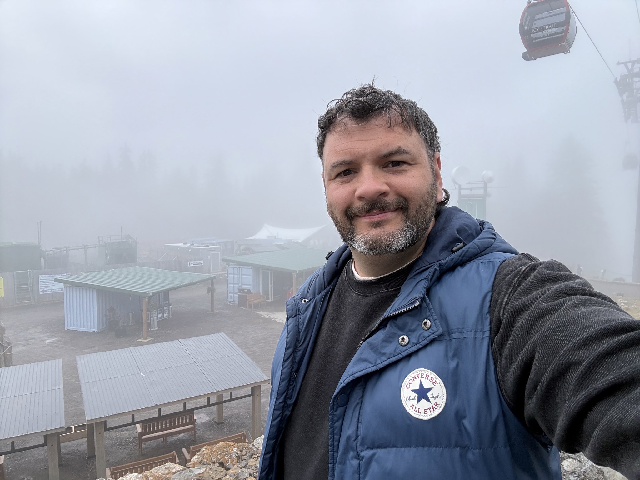 Kieran at the top of the Icy Strait Point gondola in thick fog