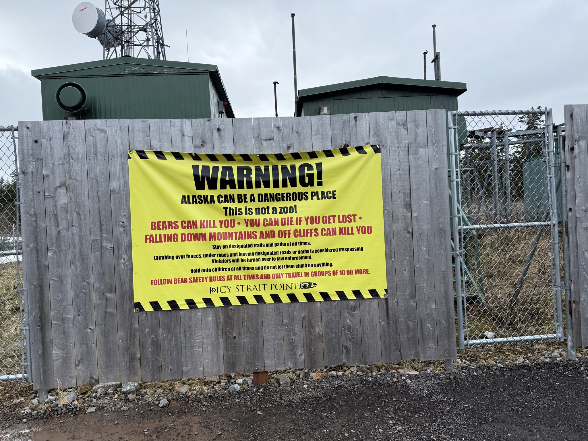 Warning sign about bears and wilderness safety at the Hoonah Mountain trailhead