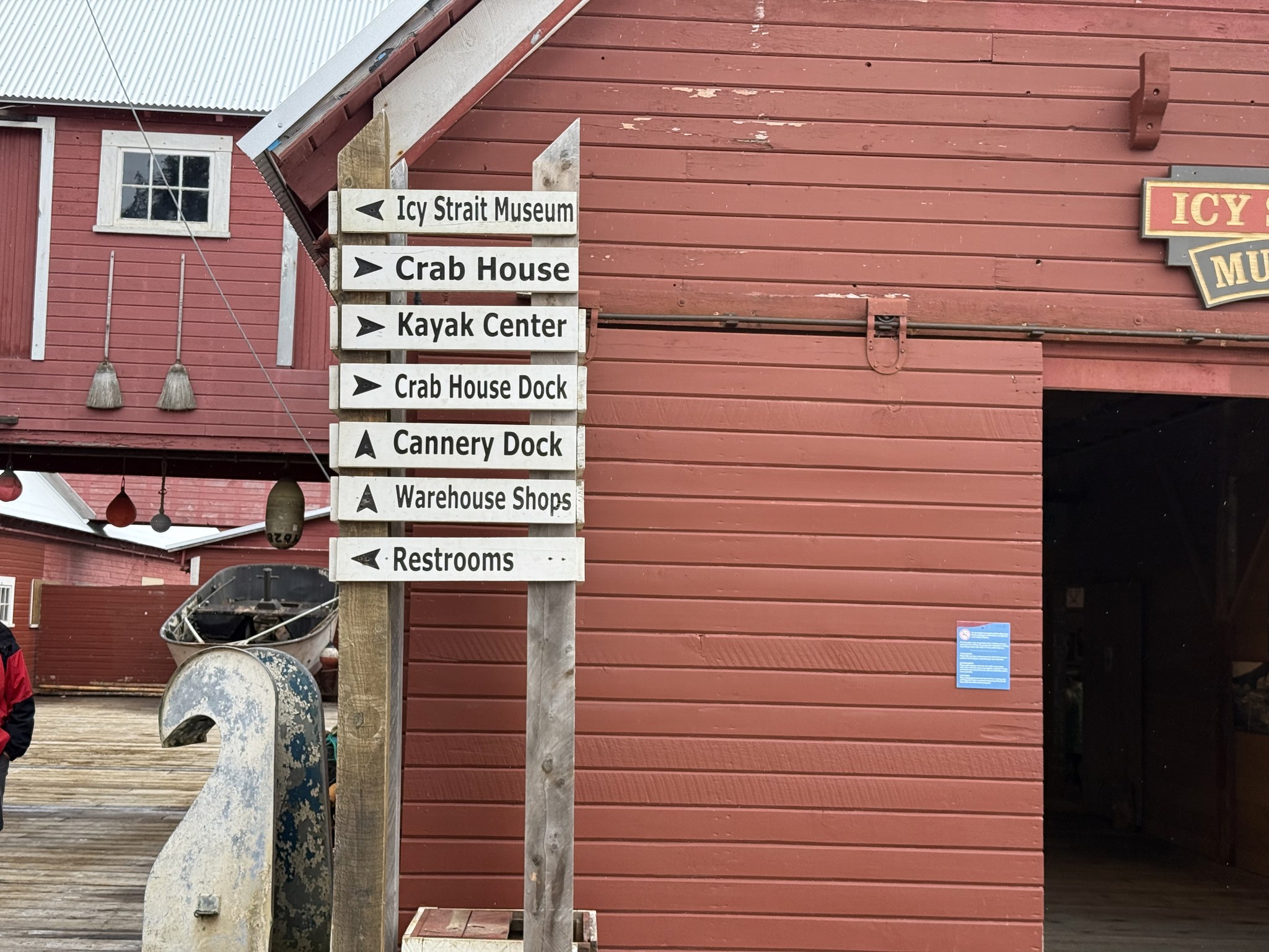 Signposts to the Crab House, Kayak Center and Cannery Dock at Icy Strait Point
