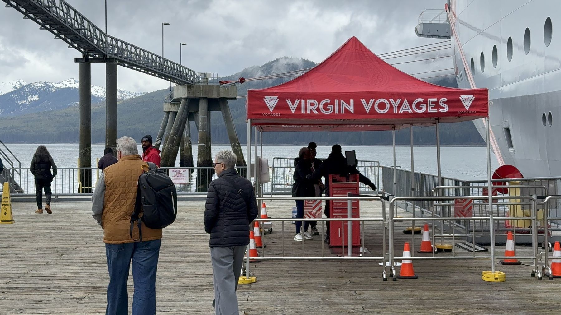 Virgin Voyages welcome tent on the pier at Icy Strait Point, Alaska