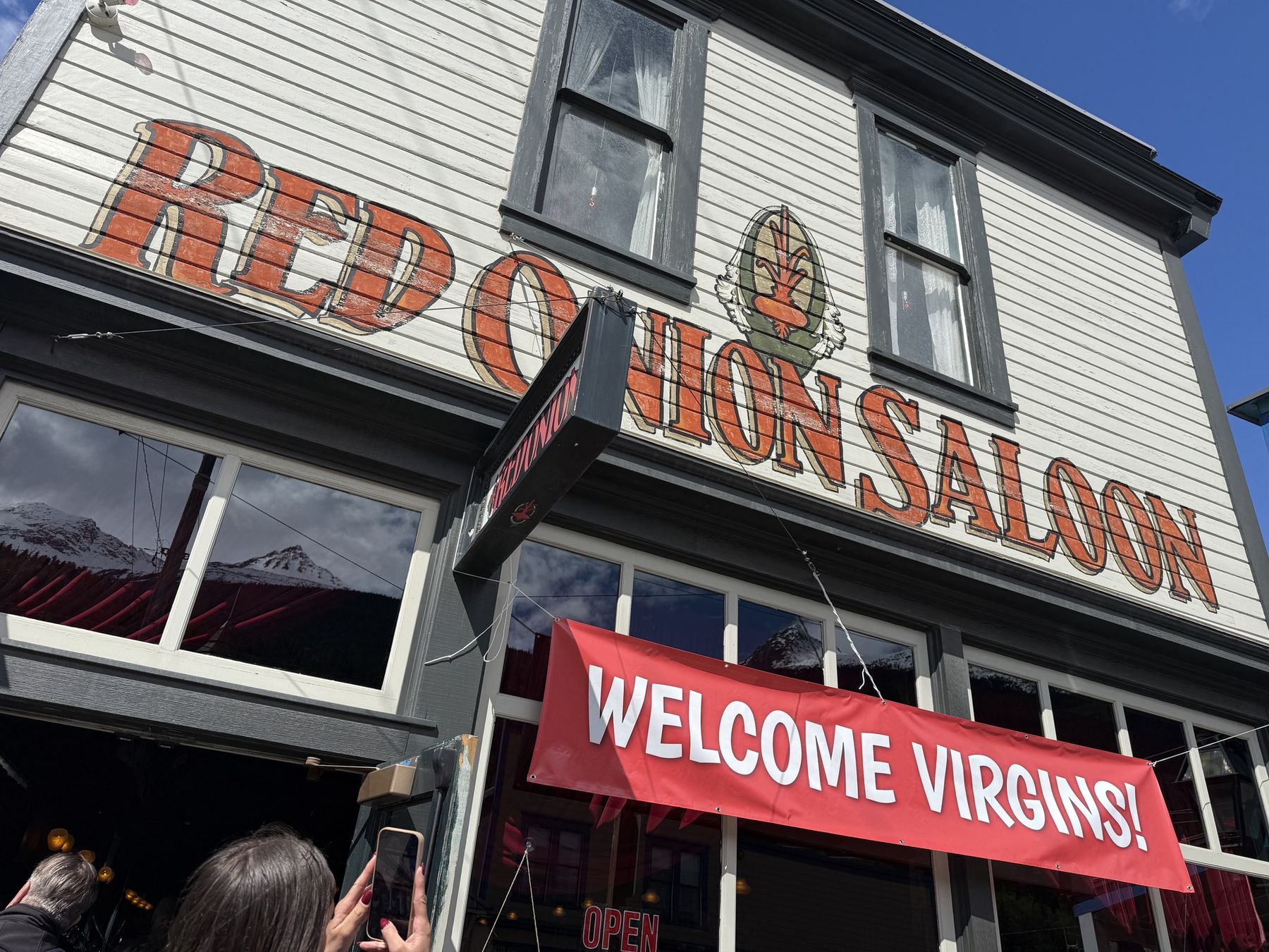The Red Onion Saloon in Skagway with a Welcome Virgins! banner