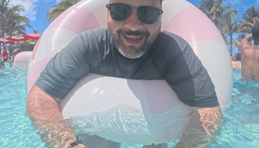 Kieran relaxing on a float in the pool at the Beach Club at Bimini