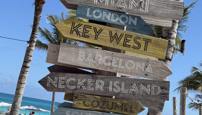 Signpost on the beach at the Beach Club at Bimini