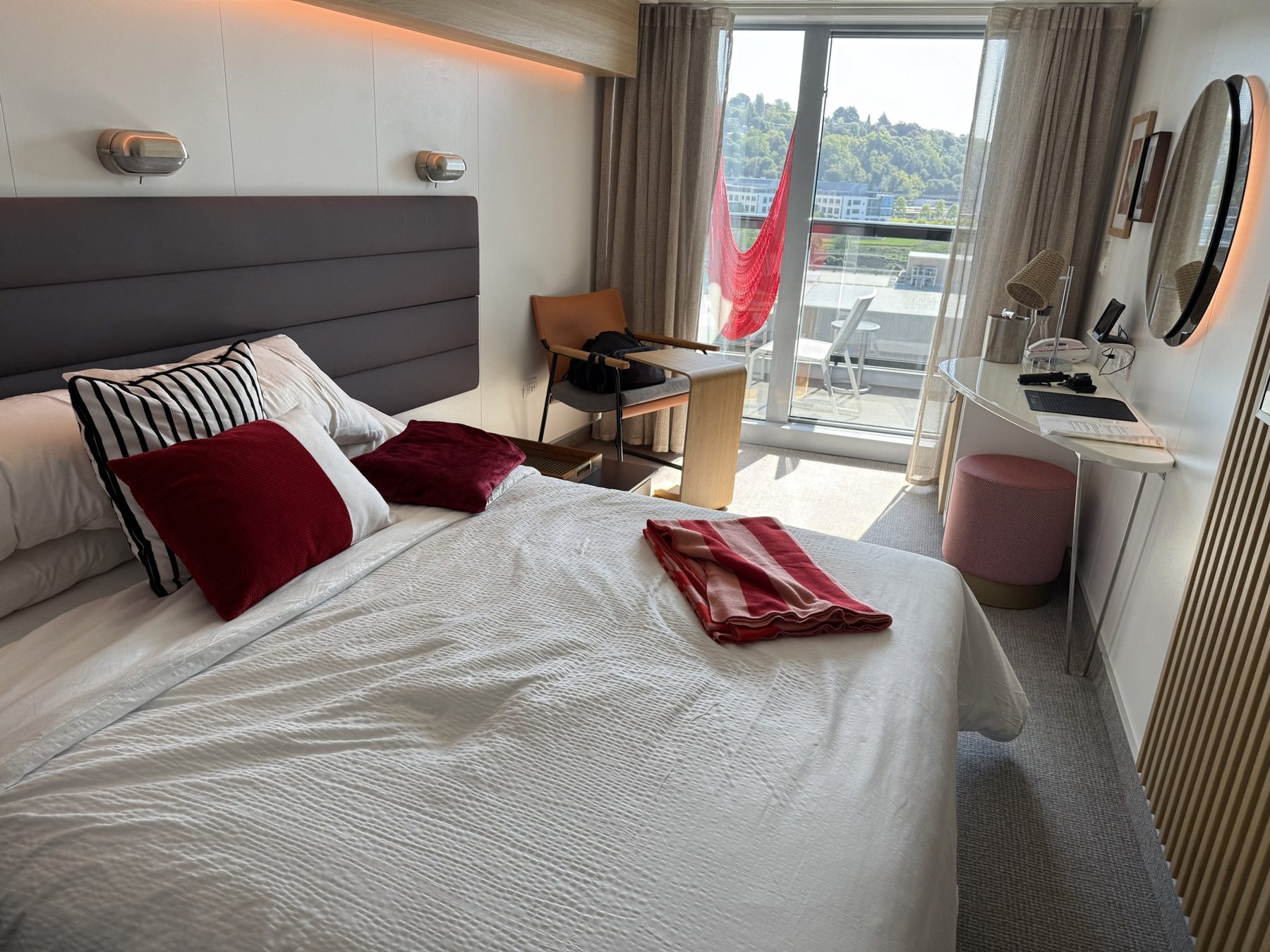 Our Sea Terrace cabin on Brilliant Lady with the red hammock on the balcony