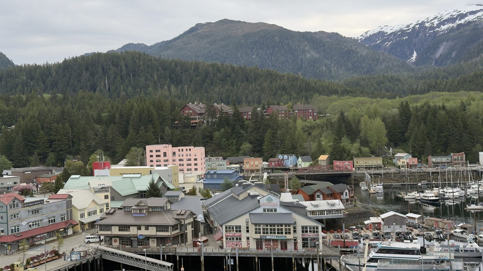 Ketchikan harbour and downtown with forested mountains behind