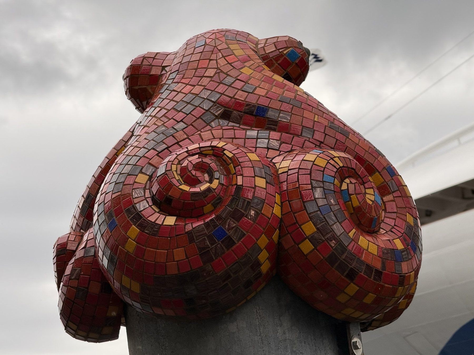 A red mosaic octopus sculpture in Ketchikan