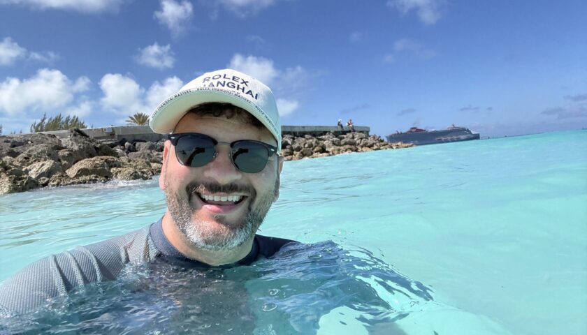 Kieran swimming in the clear water at the Beach Club at Bimini