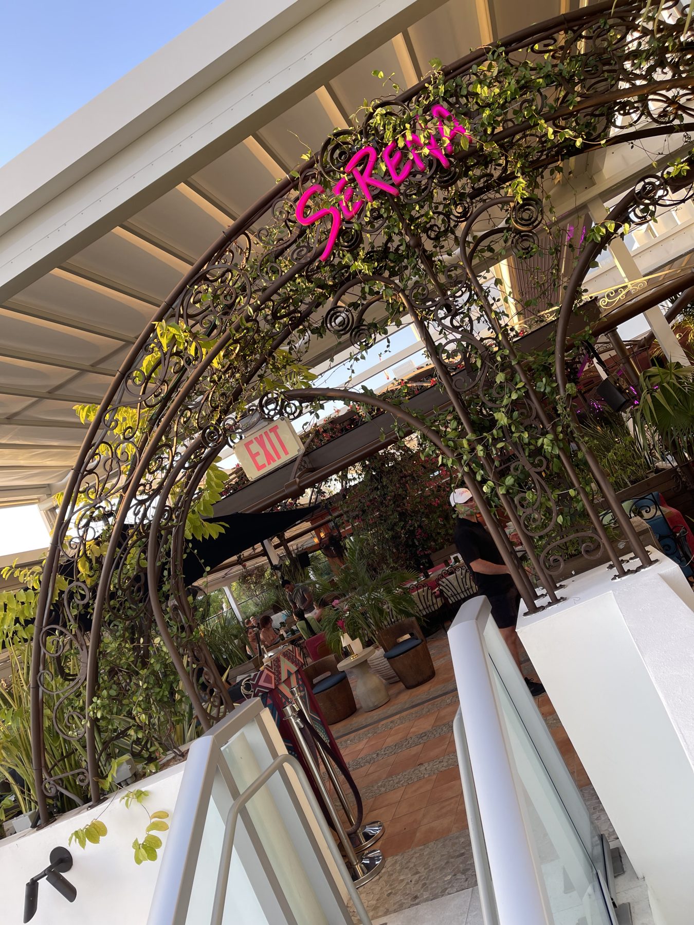 The flower-covered entrance to the rooftop restaurant at Moxy South Beach