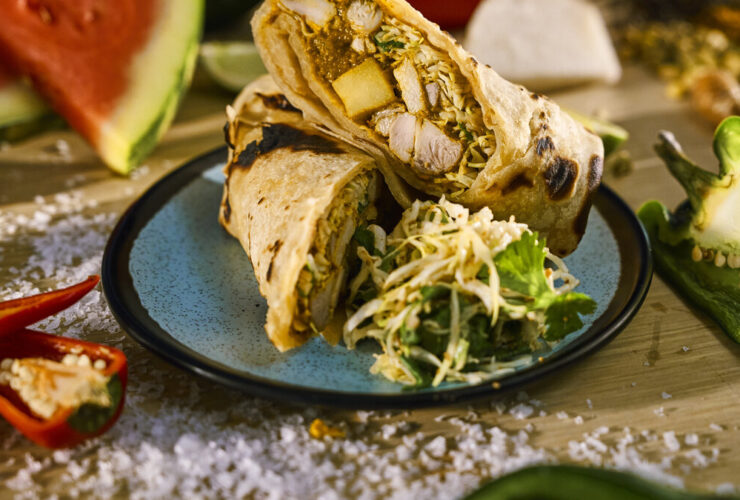Curry chicken roti with spiced cabbage slaw from the new Beach Club at Bimini menu on Virgin Voyages