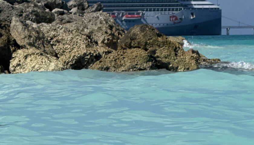 Resilient Lady seen across turquoise water from the Beach Club at Bimini
