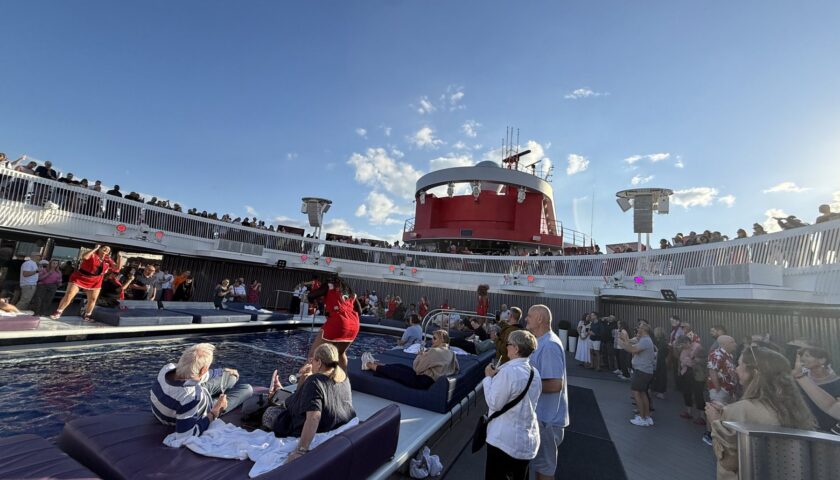 The pool deck during the sail-away party on Valiant Lady