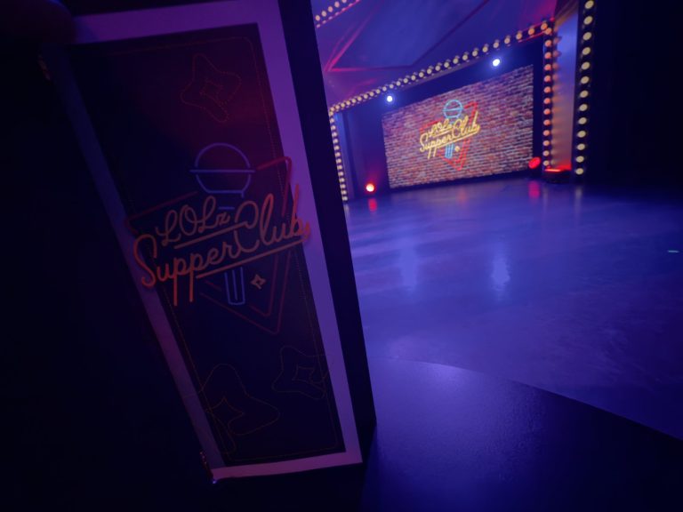 Scarlet Lady LOLz Supper Club menu cover in The Manor