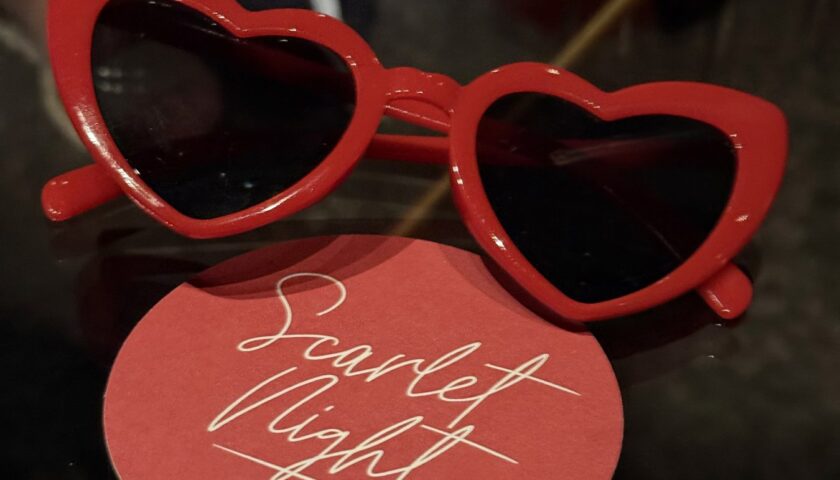 Red heart sunglasses on a Scarlet Night coaster
