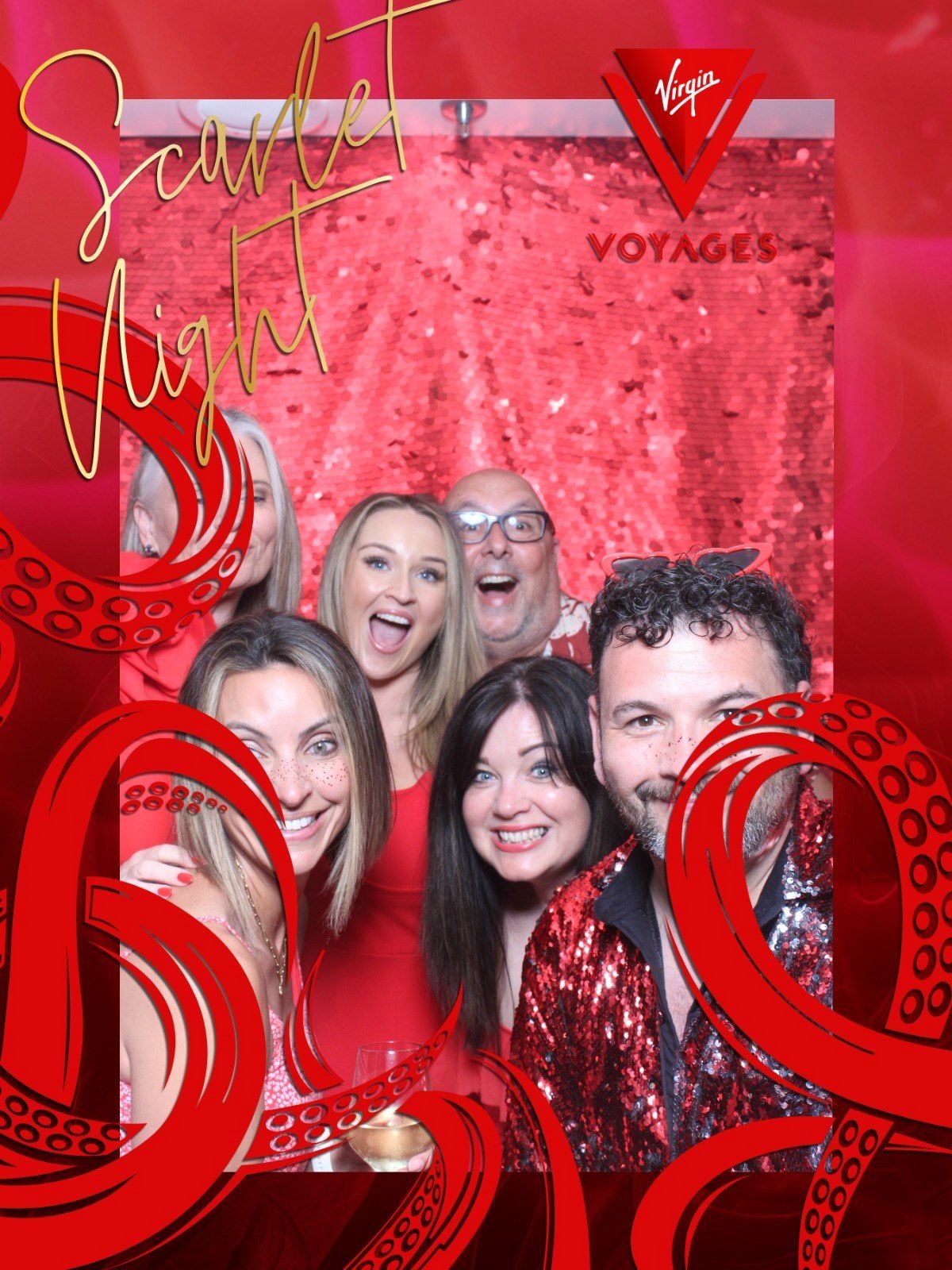 Sailors in the Scarlet Night photo booth on Virgin Voyages