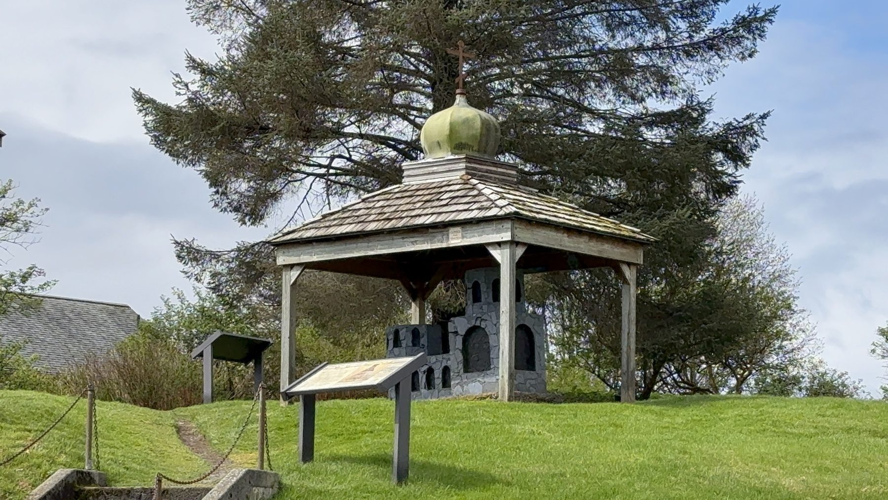 A small historic site with a gazebo in downtown Sitka