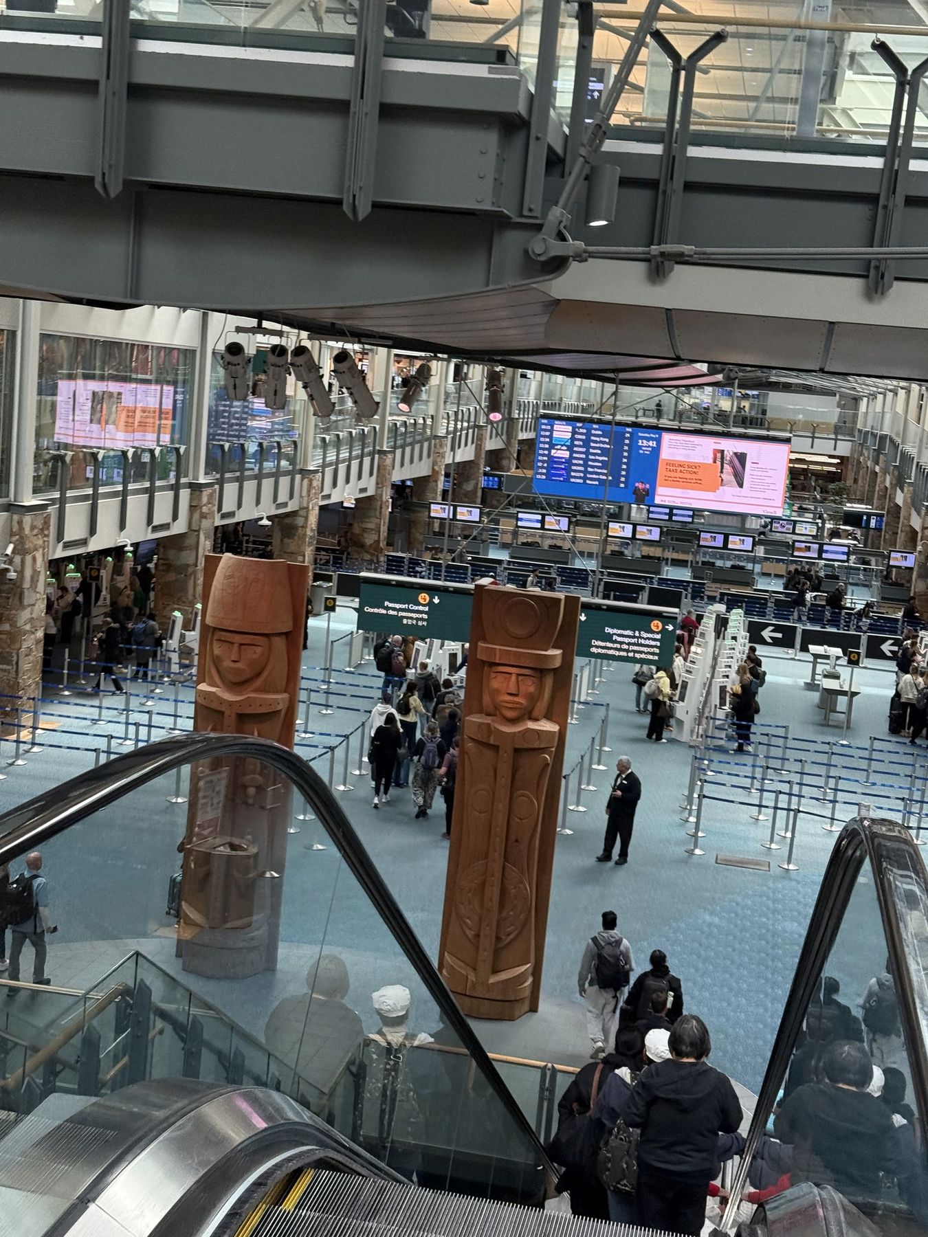 Indigenous carvings in the arrivals hall at Vancouver Airport