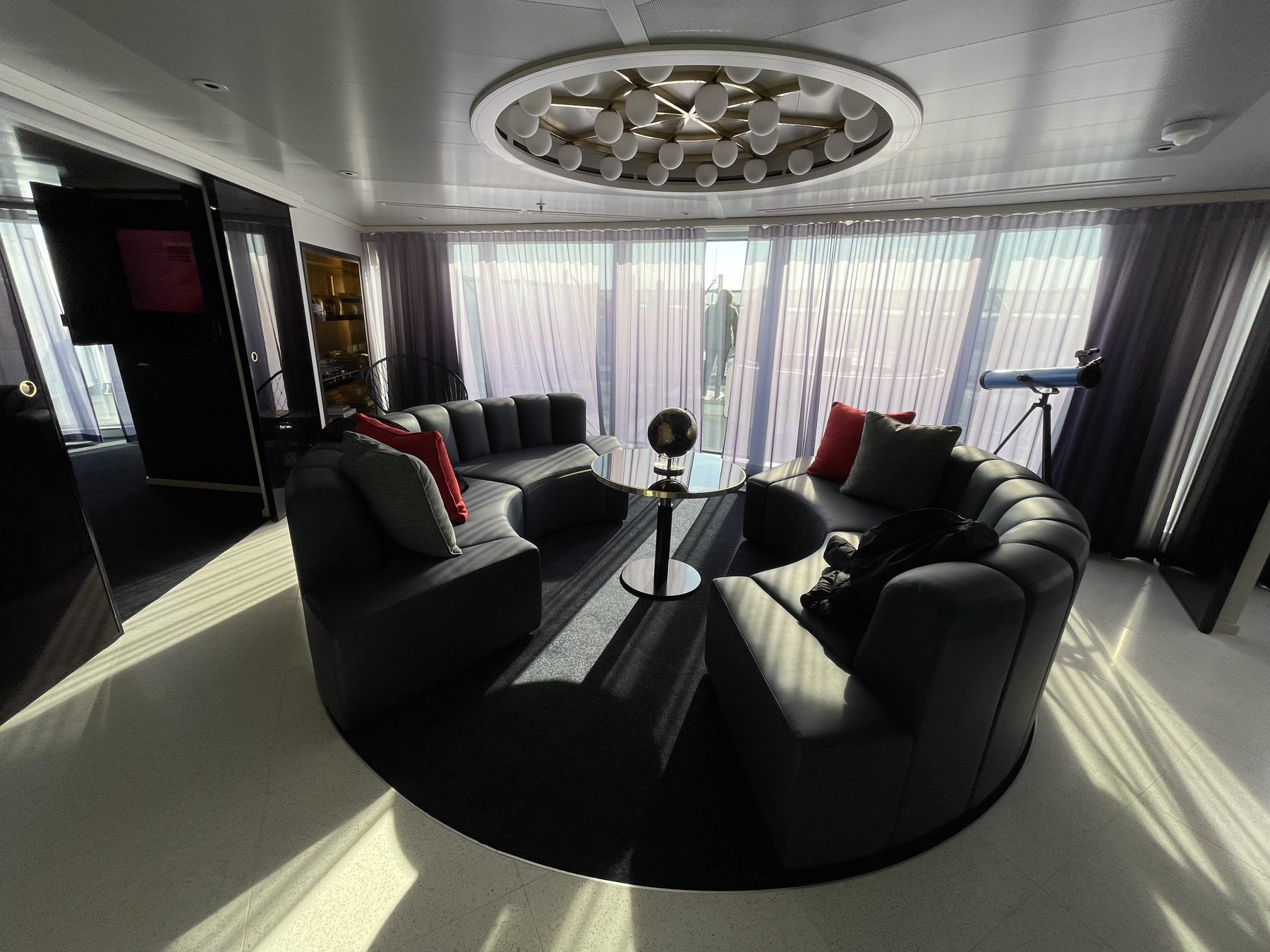 The lounge in a Virgin Voyages Mega RockStar suite
