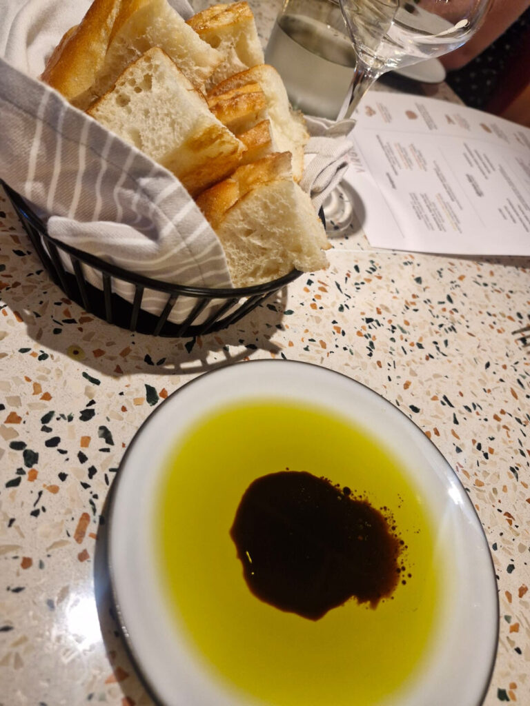 Fresh bread and olive oil at Extra Virgin on Resilient Lady
