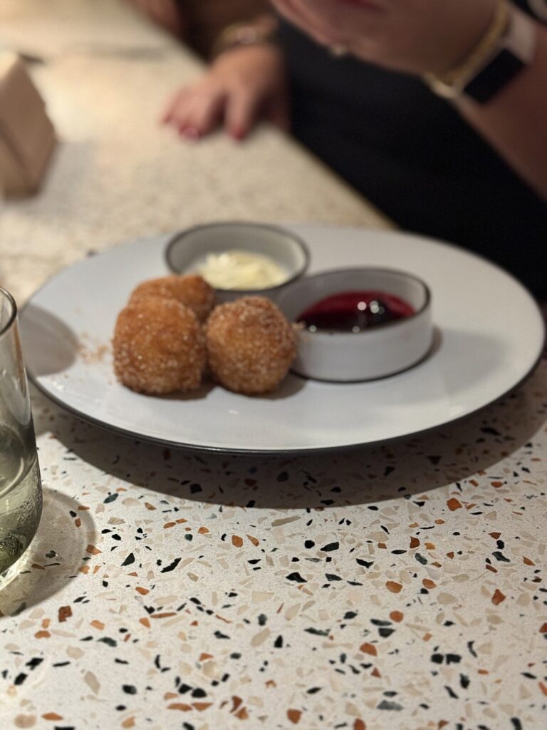 Ricotta bomboloni with cream at Extra Virgin on Resilient Lady