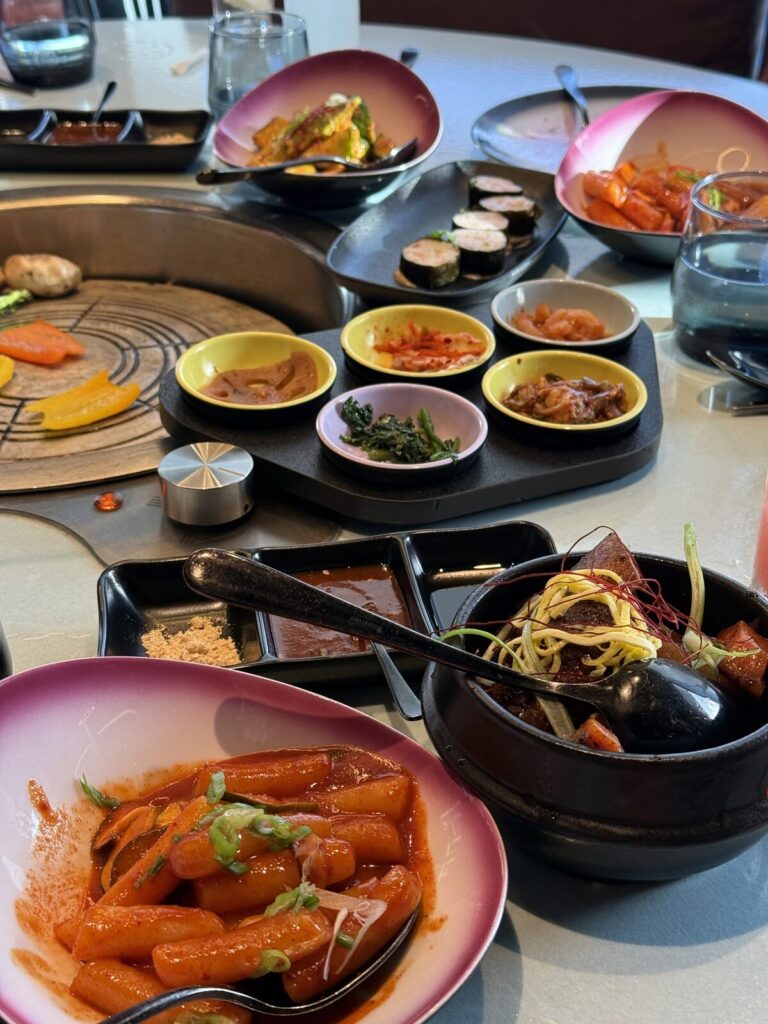 Korean barbecue table and banchan at Gunbae on Resilient Lady