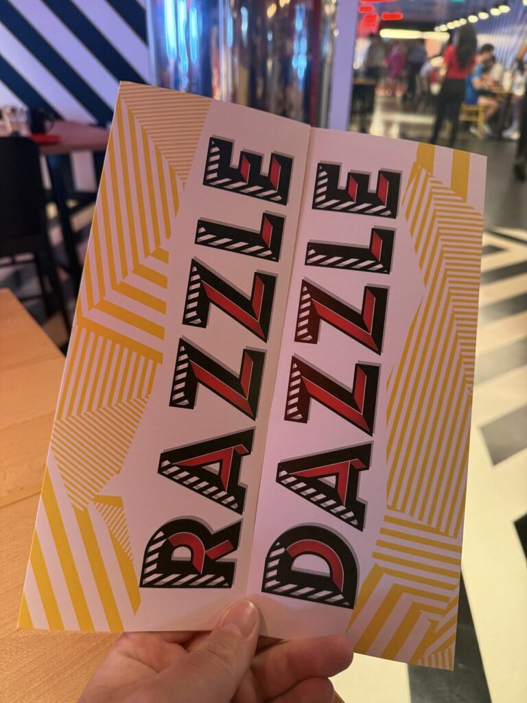 Razzle Dazzle sign on Resilient Lady