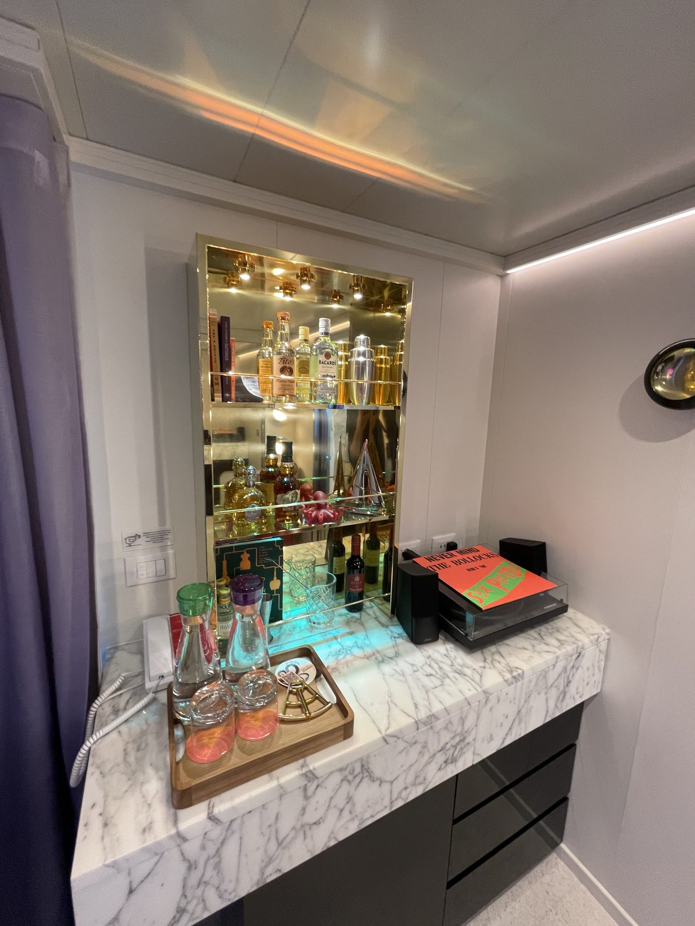 The in-room bar setup in a Virgin Voyages RockStar suite