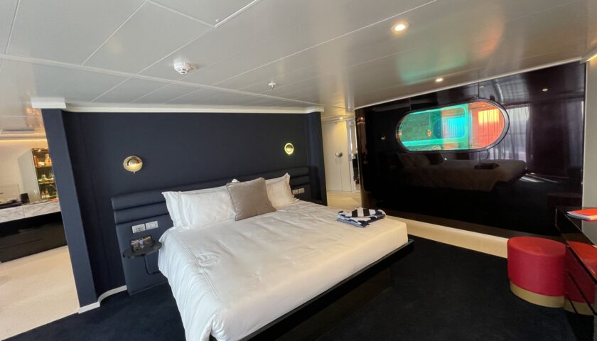Bedroom in a Virgin Voyages RockStar suite