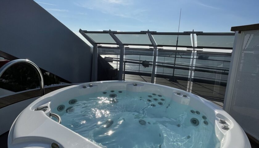 Private terrace hot tub in a Virgin Voyages Massive Suite