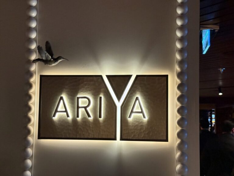 Ariya restaurant sign on Valiant Lady
