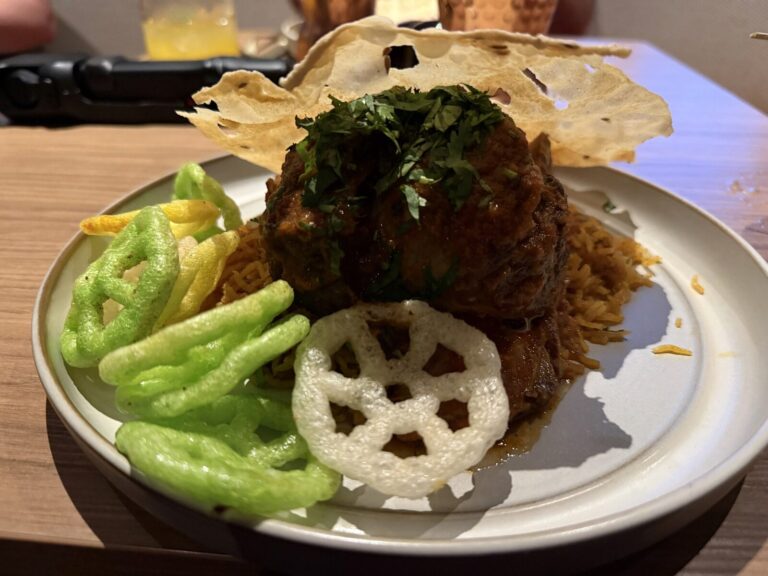 Dish with a lotus root crisp at Ariya on Valiant Lady